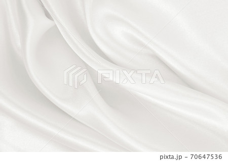 Smooth elegant golden silk or satin luxury cloth texture as wedding background. Luxurious background design. In Sepia toned. Retro style Smooth elegant golden silk or satin luxury cloth texture as wedding background. Luxurious background design. In Sepia toned. Retro style 70647536