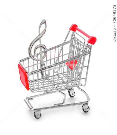 Music treble clef in shopping cart 70649278