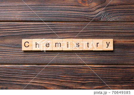 Chemistry word written on wood block. Chemistry text on cement table for your desing, concept 70649385