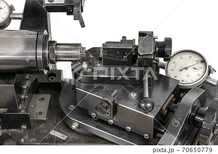Manually operated lathe for making contact lenses. 70650779