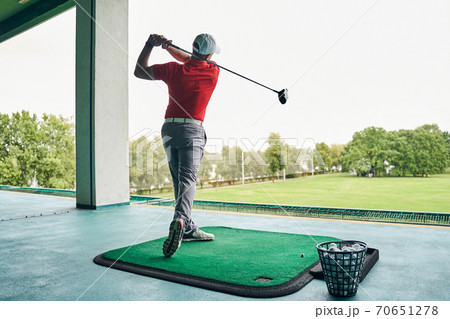 Caucasian male golfer improving the game technique Caucasian male golfer improving the game technique 70651278