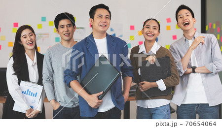 Group of Happy young business Startup coworkers working Brainstorming together to get ideas and marketing plan at office,Business Startup Diversity Concept Group of Happy young business Startup coworkers working Brainstorming together to get ideas and marketing plan at office,Business Startup Diversity Concept 70654064