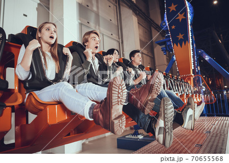 Frightened people while riding the attraction. Frightened people while riding the attraction. 70655568