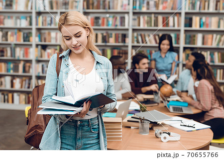 Group of ethnic multicultural students in library. 70655766