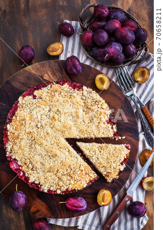 Homemade plum crumble cake Homemade plum crumble cake 70658211