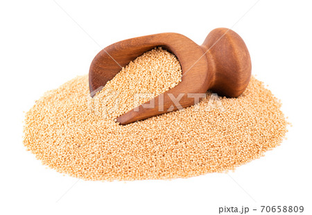 Amaranth seeds in wooden scoop, isolated on white background. Organic dry raw amaranth beans. 70658809