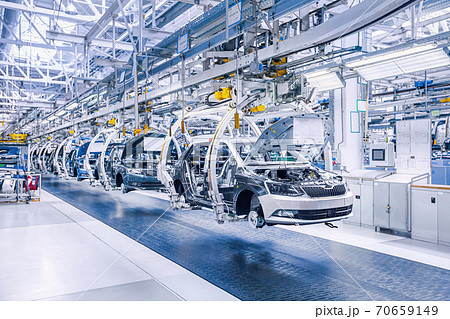 Assembling cars on conveyor line 70659149