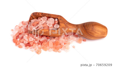Himalayan pink salt in wooden scoop, isolated on white background. Himalayan pink salt in crystals. 70659209