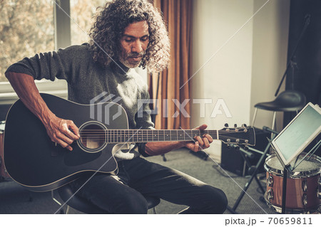 Black Man Play on Acoustic Guitar New Composition . 70659811