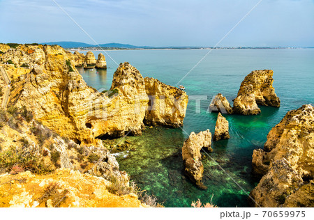 Coastal cliffs at Ponta da Piedade in Lagos, Portugal Coastal cliffs at Ponta da Piedade in Lagos, Portugal 70659975