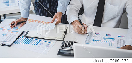 Teamwork of business team consulting market growth on financial document graph report statistics, professional presentation analyzing investment project to development grow to success Teamwork of business team consulting market growth on financial document graph report statistics, professional presentation analyzing investment project to development grow to success 70664579