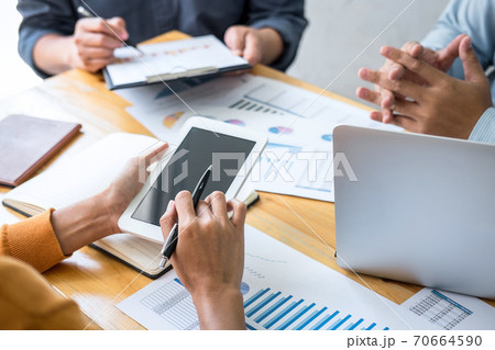 Business team meeting to conference, collaboration discussing working analyzing with financial data and marketing business strategy project, presentation and brainstorming to making profit of company 70664590