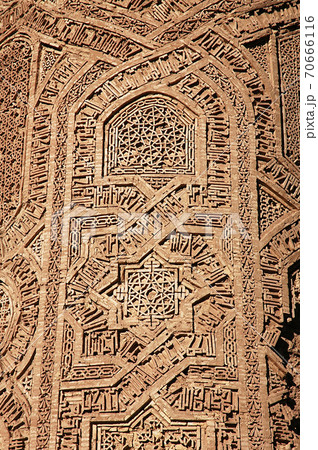 Minaret of Jam, Ghor Province in Afghanistan. The Jam minaret is a UNESCO site in a remote part of Central Afghanistan. The Minaret of Jam with detail of the geometric decoration in relief brickwork. Minaret of Jam, Ghor Province in Afghanistan. The Jam minaret is a UNESCO site in a remote part of Central Afghanistan. The Minaret of Jam with detail of the geometric decoration in relief brickwork. 70666116