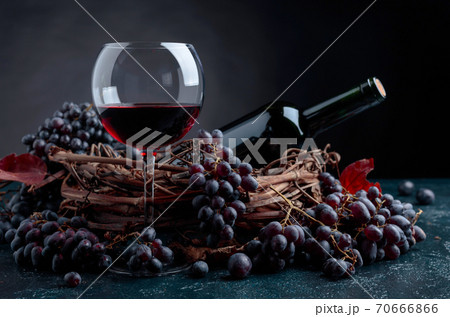 Red wine and grapes. 70666866