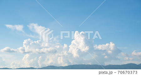 The white clouds have a strange shape and moutain. The white clouds have a strange shape and moutain. 70670373
