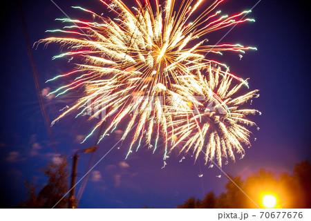 Colorful fireworks on night sky. Explosions of pyrotechnics at festival Colorful fireworks on night sky. Explosions of pyrotechnics at festival 70677676