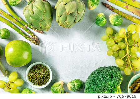 Green vegan food banner, a design template for a spring or summer menu with a place for text, a flat lay 70679619
