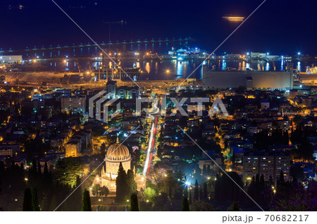 The golden dome of the Bahai Temple in Haifa illuminated by night lights. Israel. 70682217