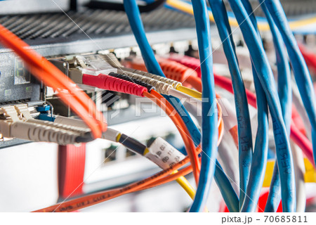 Server with patch cables plugged in ethernet ports 70685811