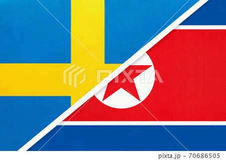 Sweden and North Korea or DPRK, symbol of national flags from textile. 70686505