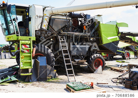Harvesters and combine parts at the plant are waiting for sales, tractors and agricultural machinery, maintenance and exports 70688586