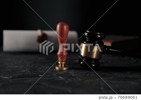 Notary's public pen and stamp on testament and last will. Notary public tools Notary's public pen and stamp on testament and last will. Notary public tools 70689061
