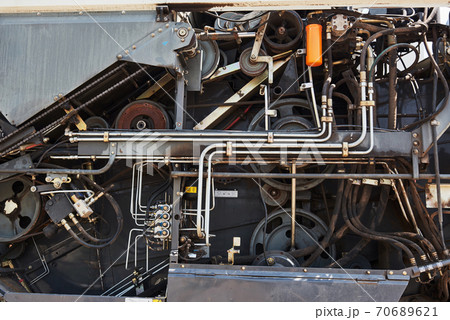 Harvesters and combine parts at the plant are waiting for sales, tractors and agricultural machinery, maintenance and exports Harvesters and combine parts at the plant are waiting for sales, tractors and agricultural machinery, maintenance and exports 70689621