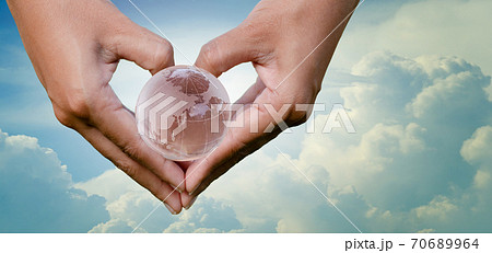 hand Heart Earth sky save environment Earth Day 22 April 70689964