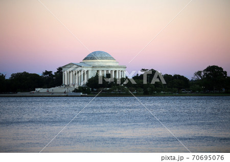 Thomas Jefferson Memorial at sunset evening glow in usa with night sky. bright monument Thomas Jefferson Memorial at sunset evening glow in usa with night sky. bright monument 70695076