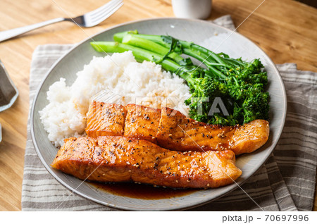 salmon teriyaki with rice and boiled broccolini 70697996