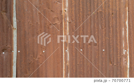 Metal steel strips. Rusty corrugated iron metal, Zinc steel wall, pattern texture background. Close-up of exterior architecture material for design decoration background. 70700771