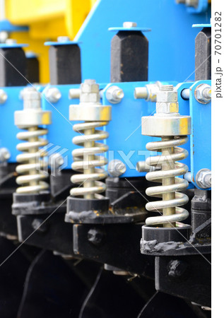 Spring system of agricultural seeder close up 70701282