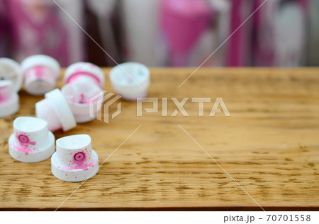 The soiled pink nozzles from the paint sprayer The soiled pink nozzles from the paint sprayer 70701558