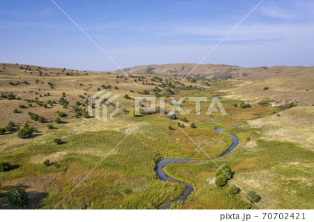 stream meandering in Nebraska Sandhills stream meandering in Nebraska Sandhills 70702421