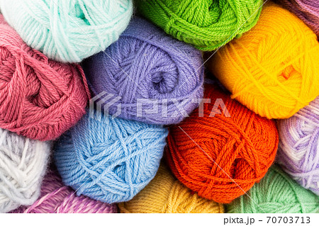 Stack of knitting yarn clews Stack of knitting yarn clews 70703713