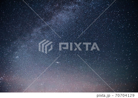 Vibrant night sky with stars and nebula and galaxy. Deep sky astrophoto 70704129
