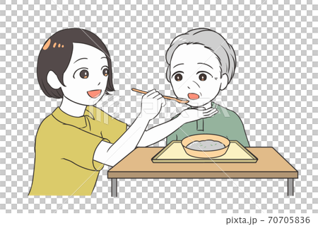 Female caregiver assisting elderly women with meals Female caregiver assisting elderly women with meals 70705836