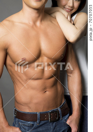 マッチョな男性と女性の写真素材