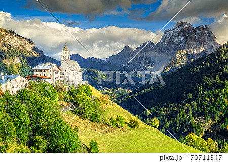 Amazing spring landscape with church on the hill, Dolomites, Italy 70711347