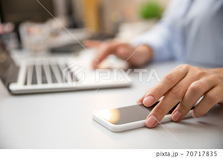 Remote working from home. Workplace in home office with PC, devices and gadgets. 70717835