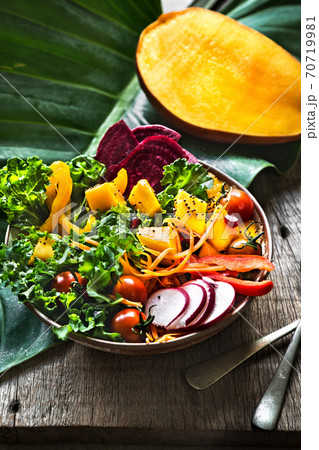 Mango with Kale,Radish and Pomegranate salad 70719981