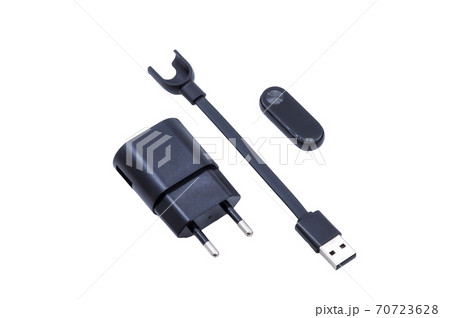 smart watch on charge, fitness watch and charger, sports watch on white background smart watch on charge, fitness watch and charger, sports watch on white background 70723628