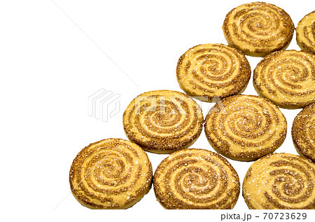 round cookies sprinkled with sugar, round cookies, curled cookies with sugar round cookies sprinkled with sugar, round cookies, curled cookies with sugar 70723629