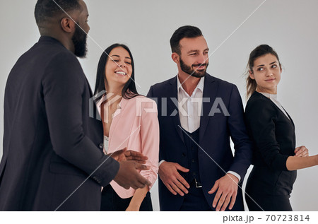 The business people dancing on the white background 70723814