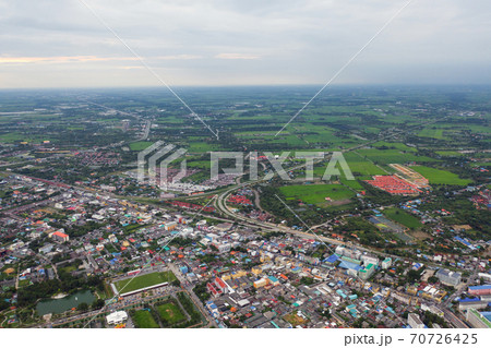 Aerial view of Cha Choeng Sao town, Chonburi near Bangkok, Thailand. Tourism city in Asia. Hotels and residential buildings with blue sky at noon. Aerial view of Cha Choeng Sao town, Chonburi near Bangkok, Thailand. Tourism city in Asia. Hotels and residential buildings with blue sky at noon. 70726425