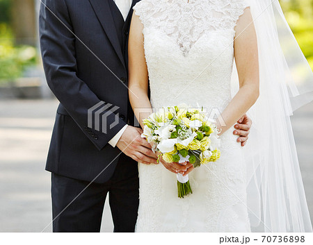 Young wedding caucasian couple. Groom and bride together. Young wedding caucasian couple. Groom and bride together. 70736898
