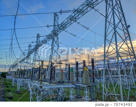 High voltage power transformer substation. Hight voltage tower with blue sky  70743492