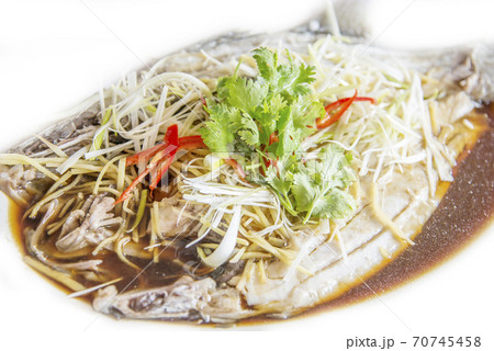 Steamed pomfret with soy sauce 70745458