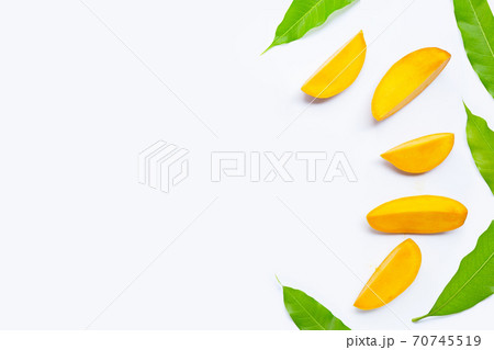 Tropical fruit, Mango  slices with leaves on white background. 70745519