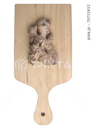 Fresh ginger on cutting board Fresh ginger on cutting board 70755652